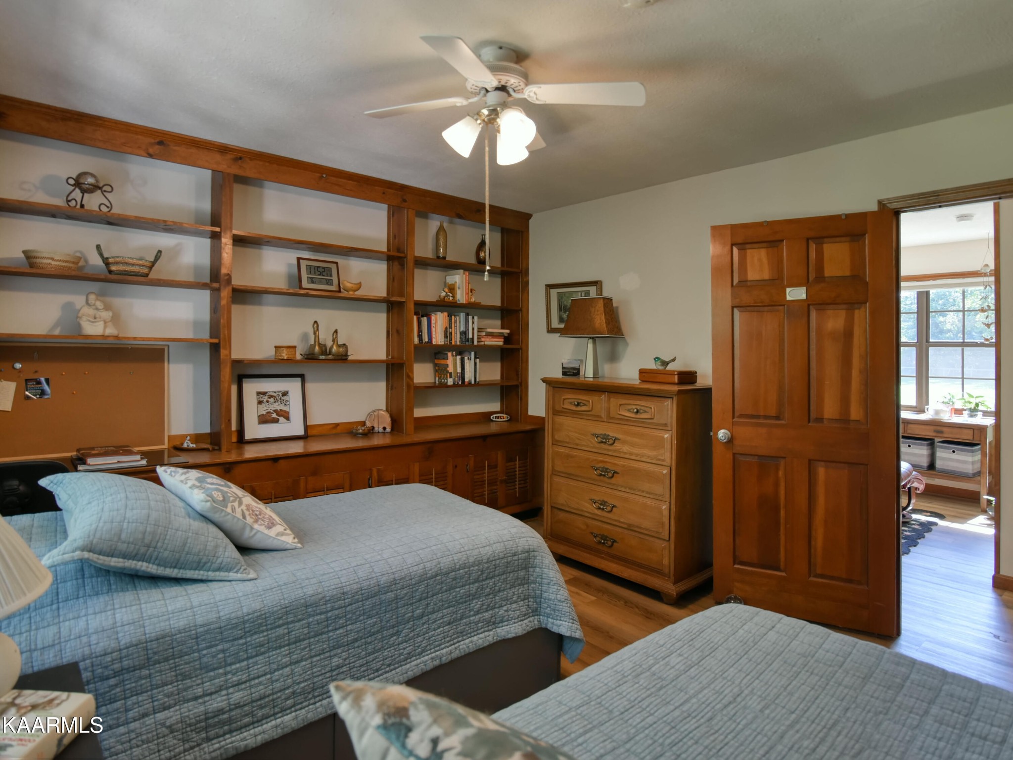 1203 Mountain Road Clinton, TN 37716 - Photo 36 of 59 a bedroom with a bed and a dresser