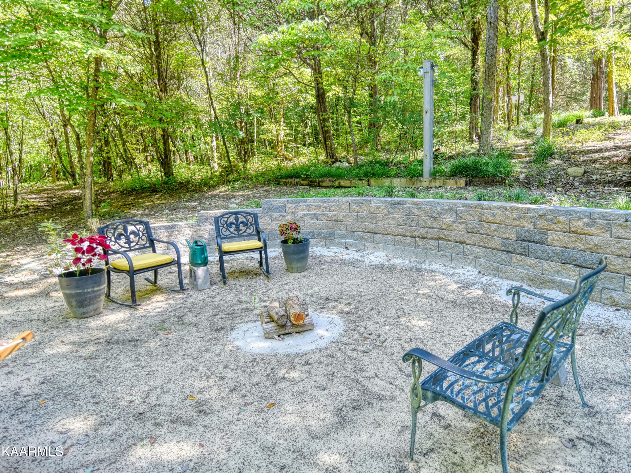1203 Mountain Road Clinton, TN 37716 - Photo 47 of 59 a view of back yard with table and chairs and potted plants