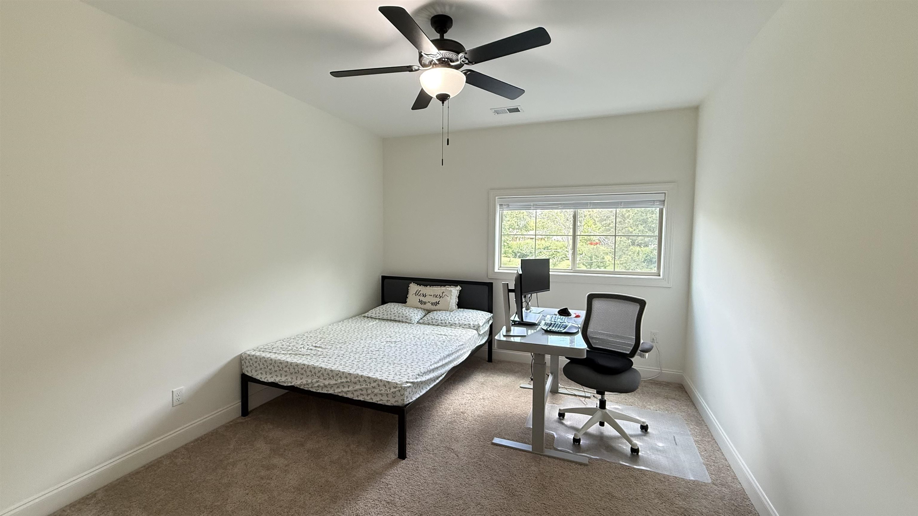 1746 Chadwick Farms Loop North Collierville, TN 38017 - Photo 23 of 35 Carpeted bedroom featuring an office area and a ceiling fan