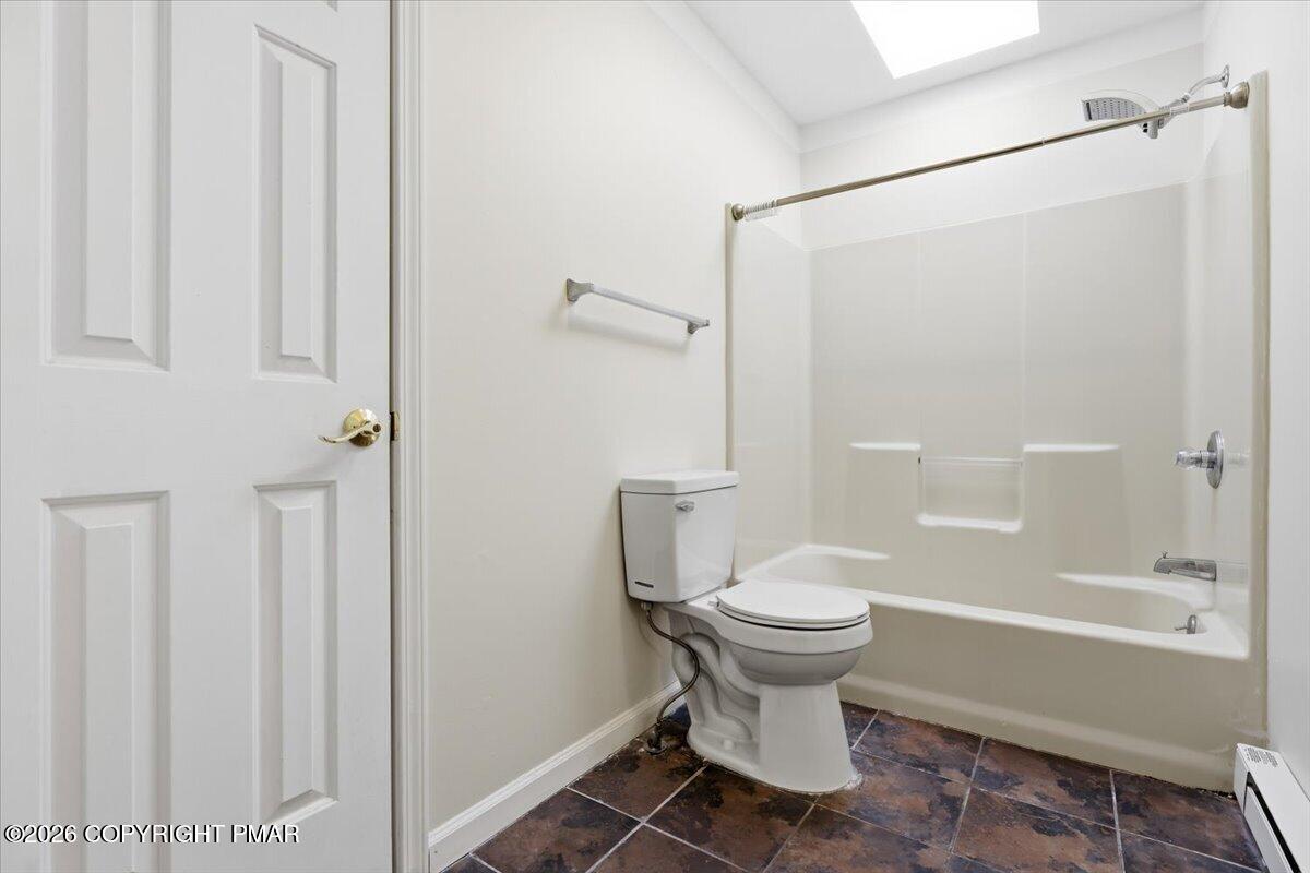 12 Devonshire Lane Mount Pocono, PA 18344 - Photo 27 of 39 a bathroom with a toilet and shower