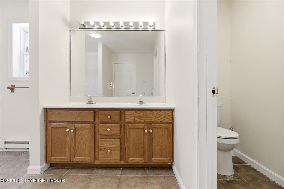 12 Devonshire Lane Mount Pocono, PA 18344 - Photo 33 of 39 a bathroom with a sink and a mirror