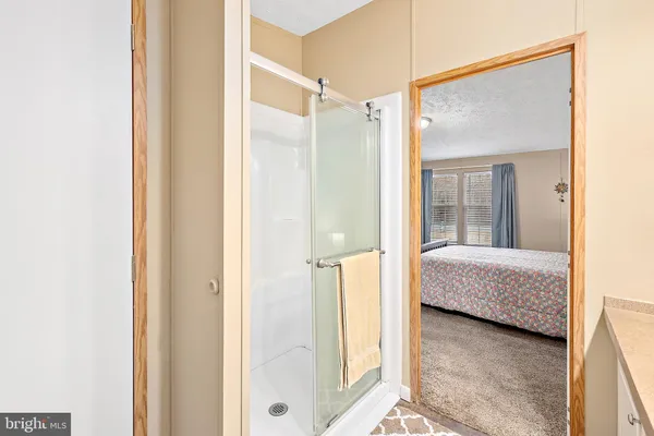 a bedroom with a bed and furniture