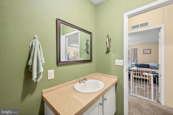 an empty room with furniture and windows