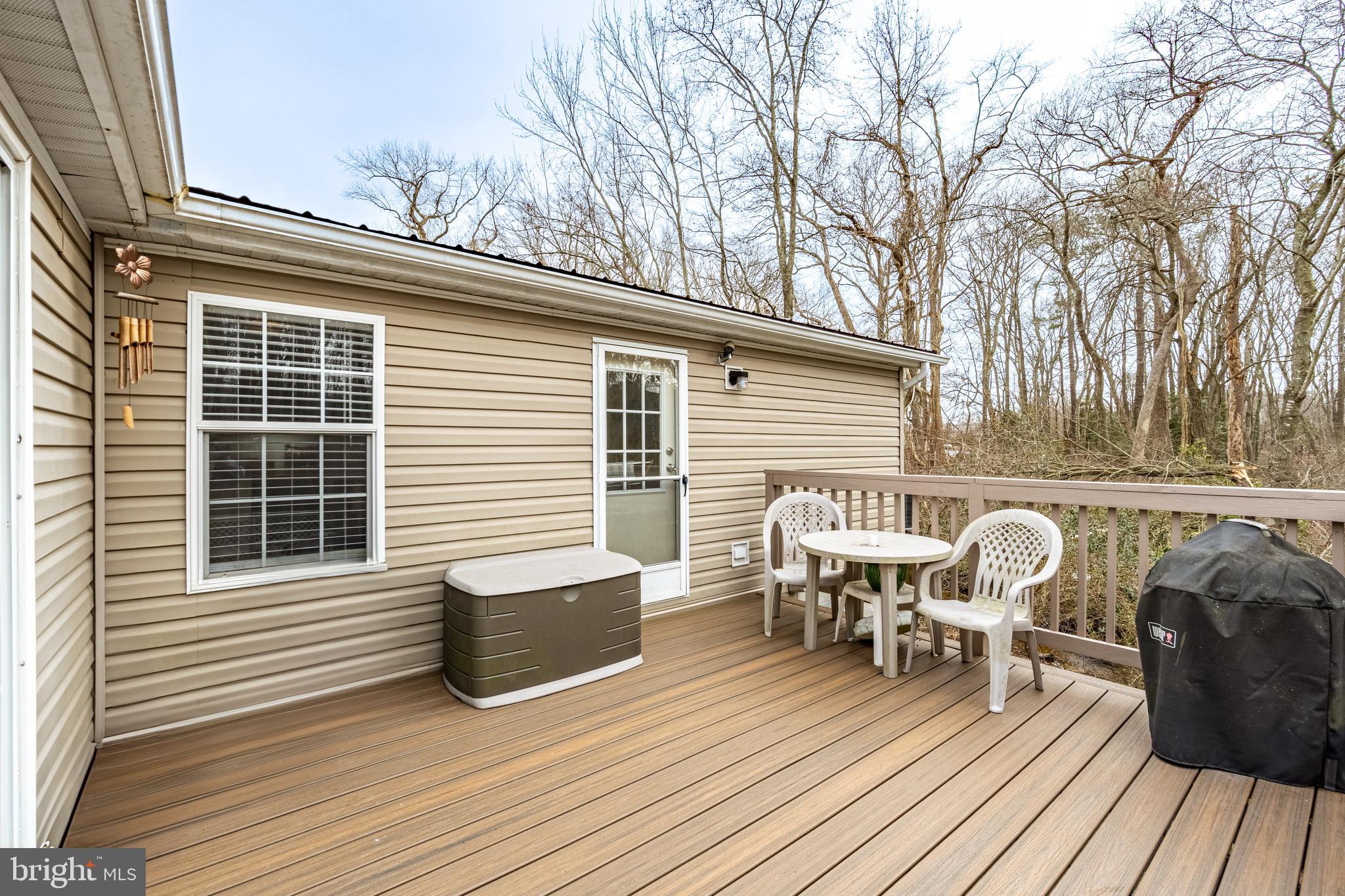 13301 Old Stage Road Bishopville, MD 21813 - Photo 36 of 43 a view of a chairs on the deck