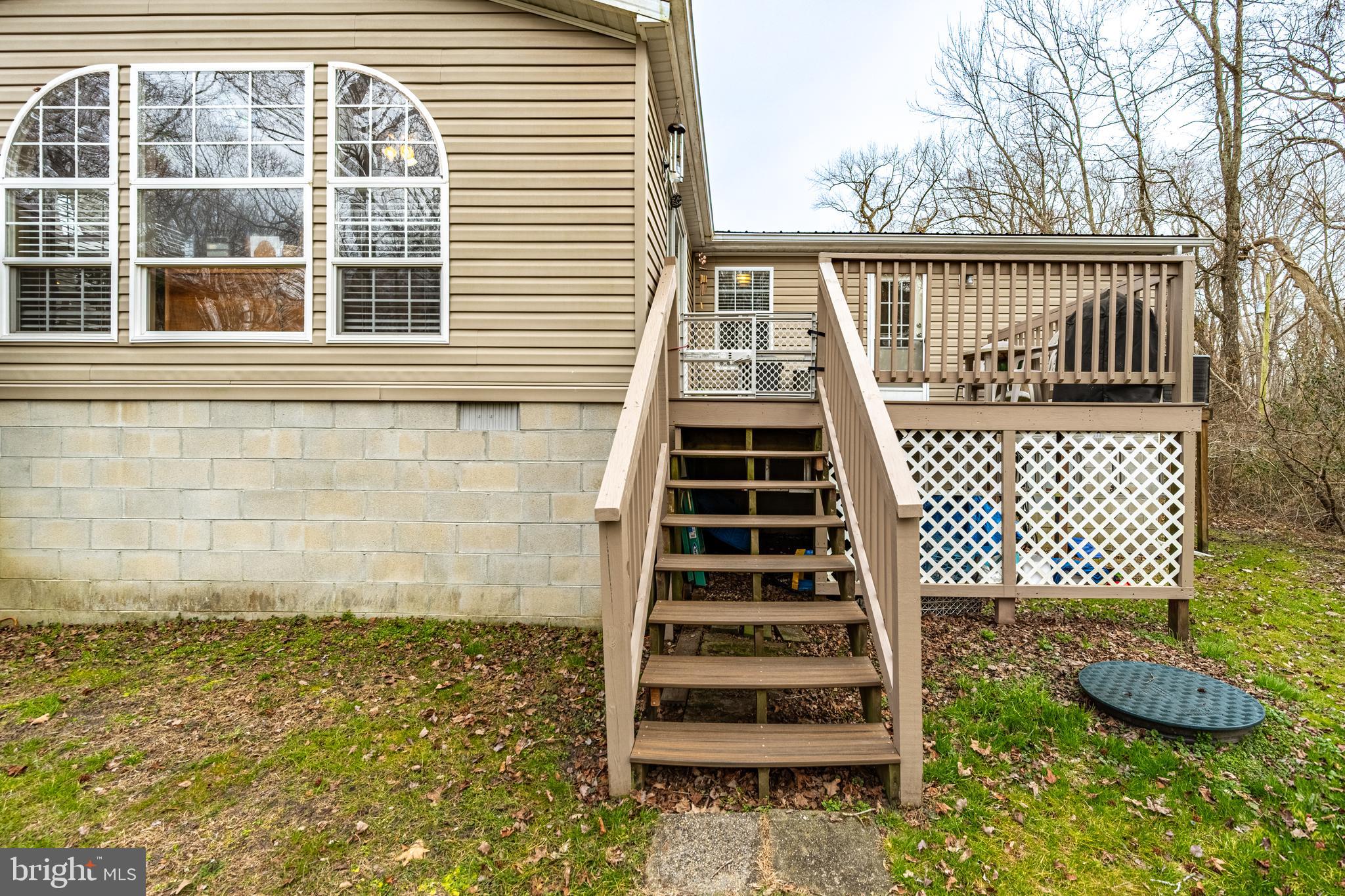 13301 Old Stage Road Bishopville, MD 21813 - Photo 38 of 43 a view of a balcony with wooden fence