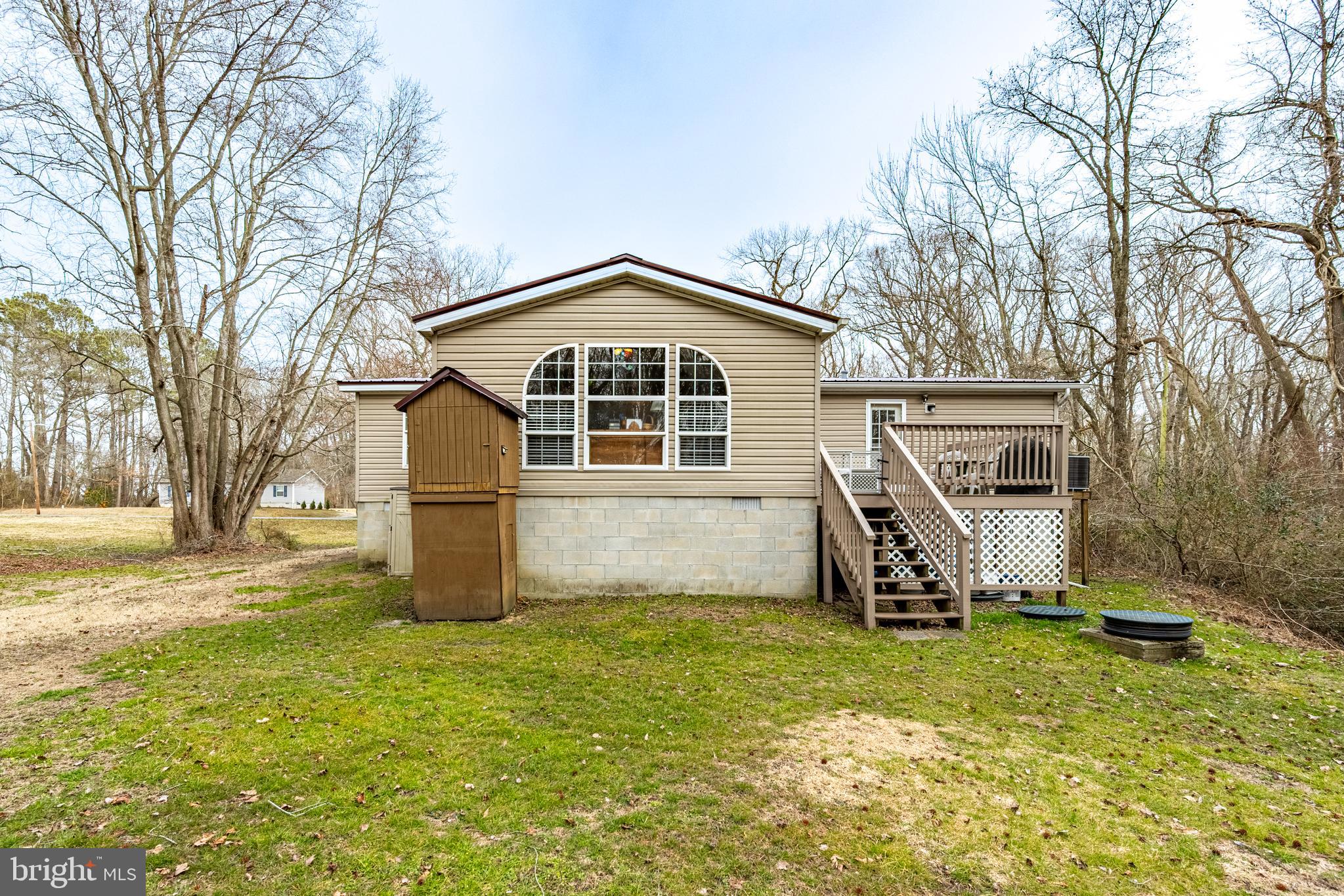 13301 Old Stage Road Bishopville, MD 21813 - Photo 39 of 43 a front view of a house with garden