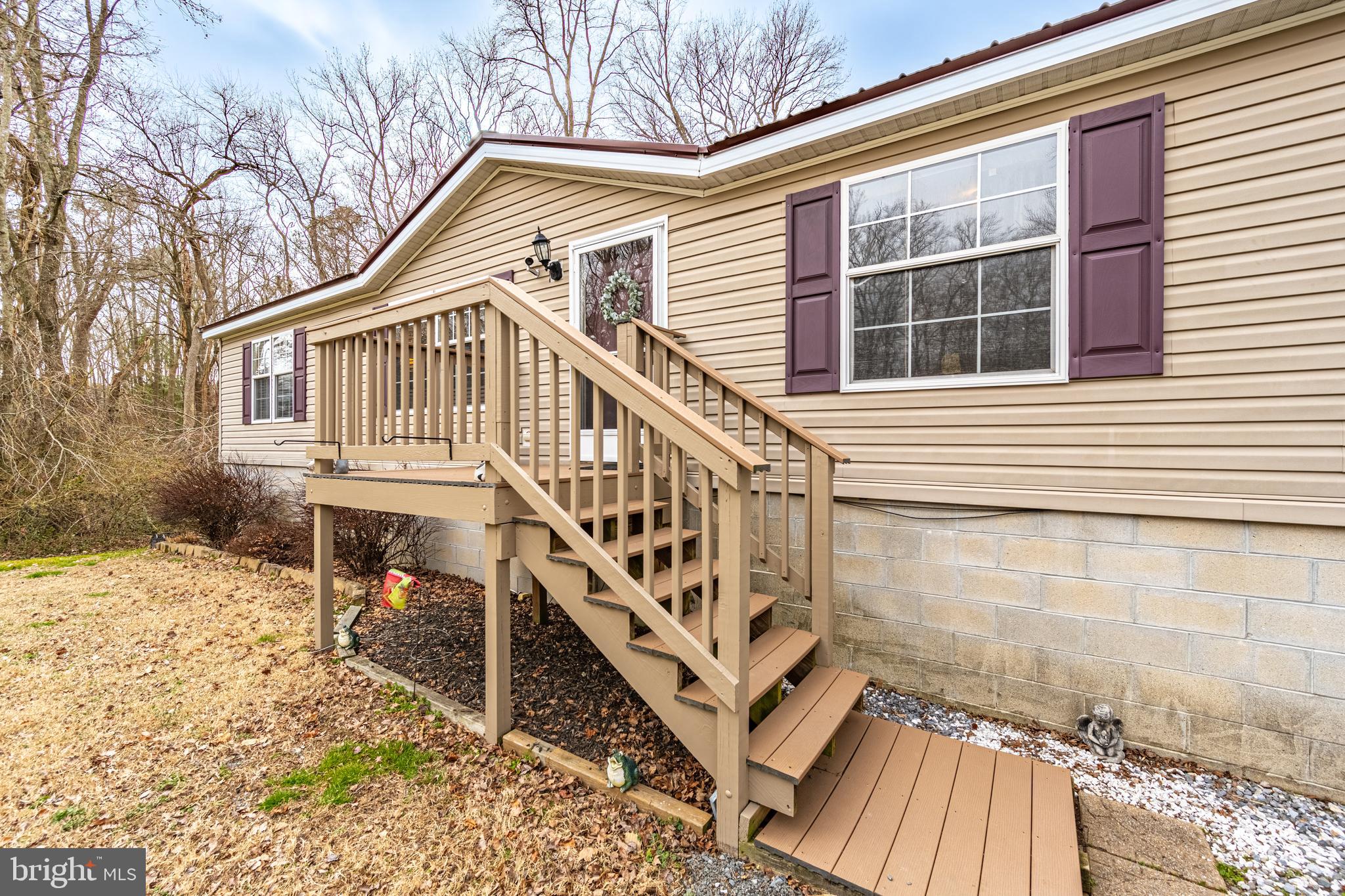 13301 Old Stage Road Bishopville, MD 21813 - Photo 42 of 43 a front view of a house with a yard