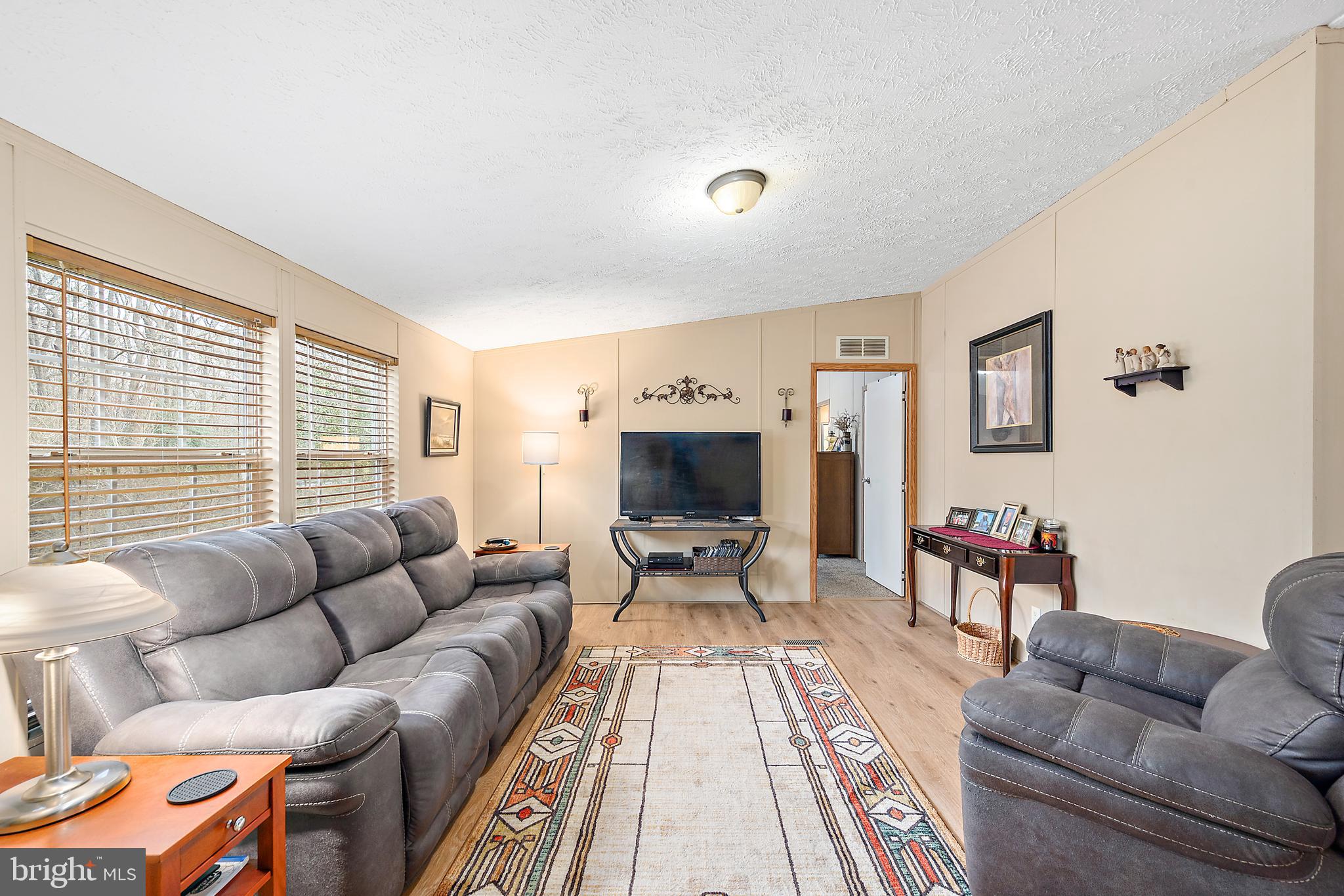 13301 Old Stage Road Bishopville, MD 21813 - Photo 5 of 43 a living room with furniture and a large window