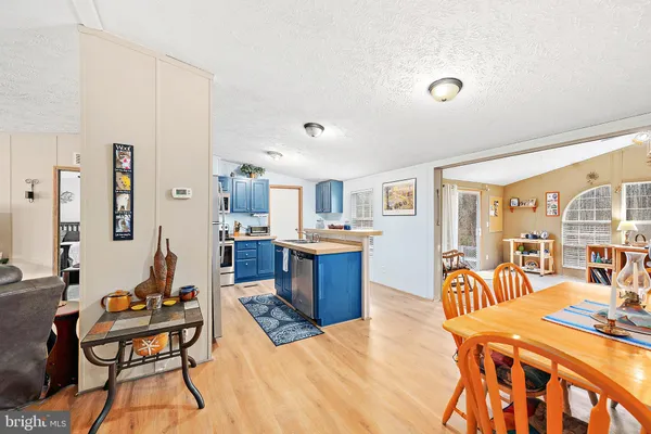 a view of a dining room with furniture