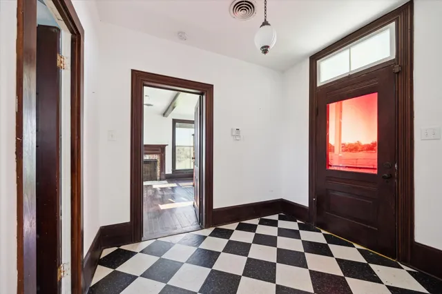 a black and white checkered floor with a black white checkered floor