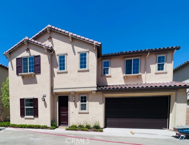 27613 Skylily Way San Pedro, CA 90732 - Photo 1 of 27 a front view of a house with a garage