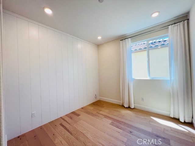27613 Skylily Way San Pedro, CA 90732 - Photo 13 of 27 a view of empty room with wooden floor and fan