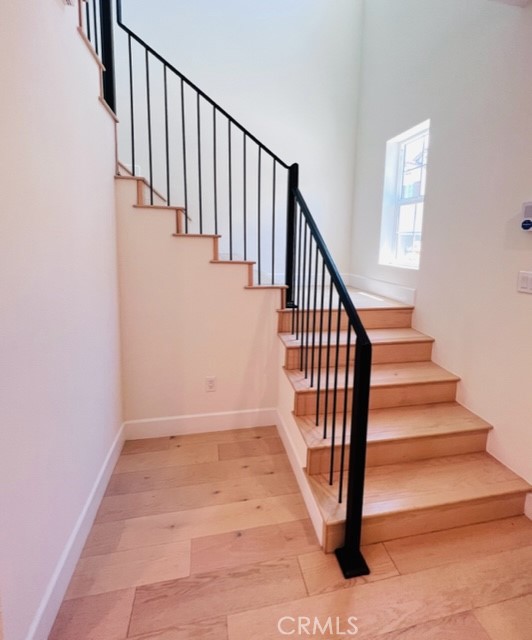 27613 Skylily Way San Pedro, CA 90732 - Photo 15 of 27 a view of staircase with white walls and a window