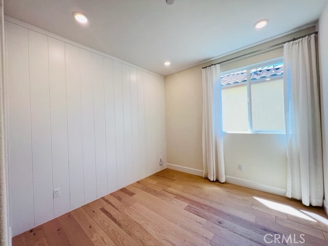 27613 Skylily Way San Pedro, CA 90732 - Photo 17 of 27 a view of empty room with wooden floor and fan