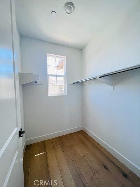 27613 Skylily Way San Pedro, CA 90732 - Photo 25 of 27 a view of a room with wooden floor and window