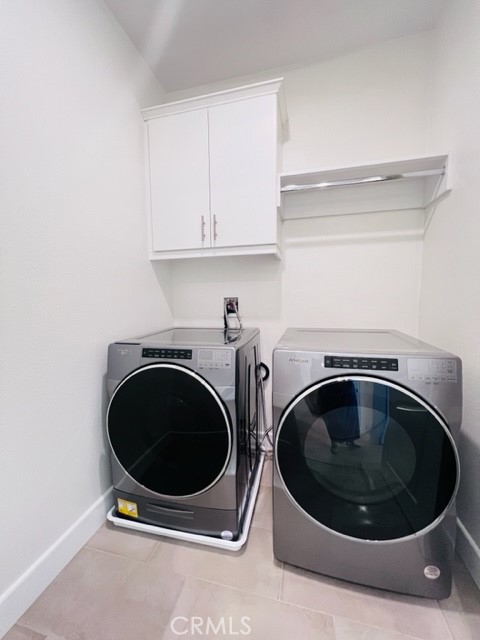 27613 Skylily Way San Pedro, CA 90732 - Photo 27 of 27 a utility room with dryer and washer
