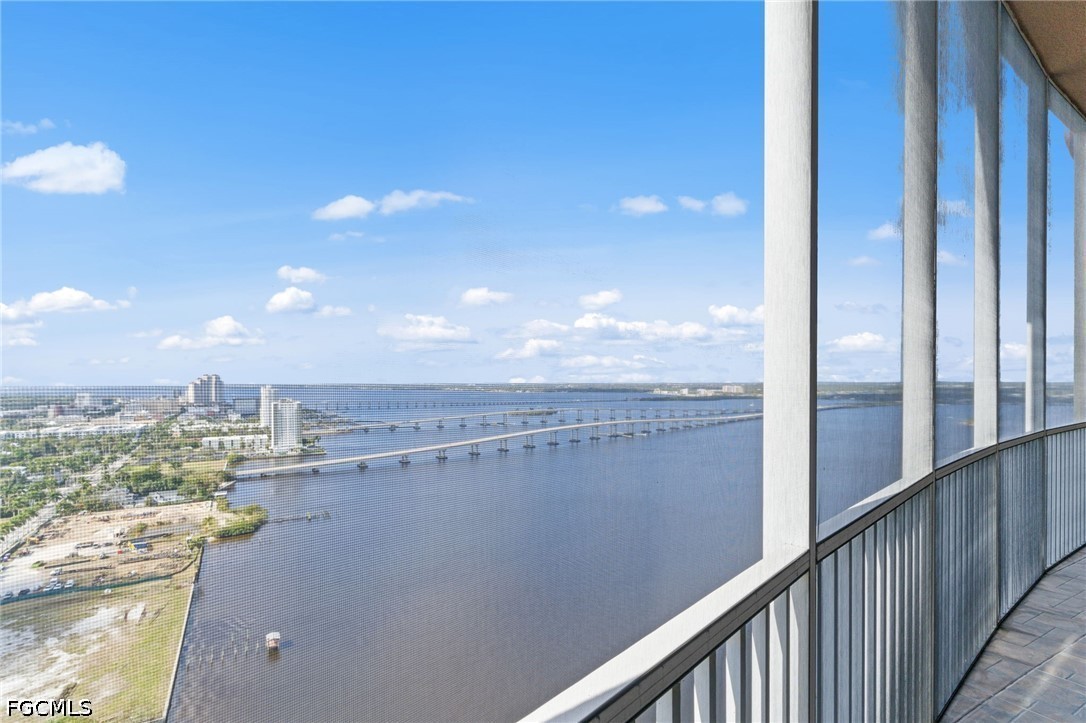 a view of a balcony with an ocean view