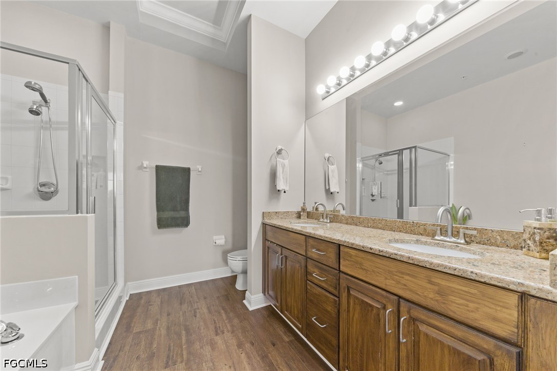 2743 First Street, Unit 2703 Fort Myers, FL 33916 - Photo 21 of 50 a bathroom with a granite countertop double vanity sink a mirror and a shower
