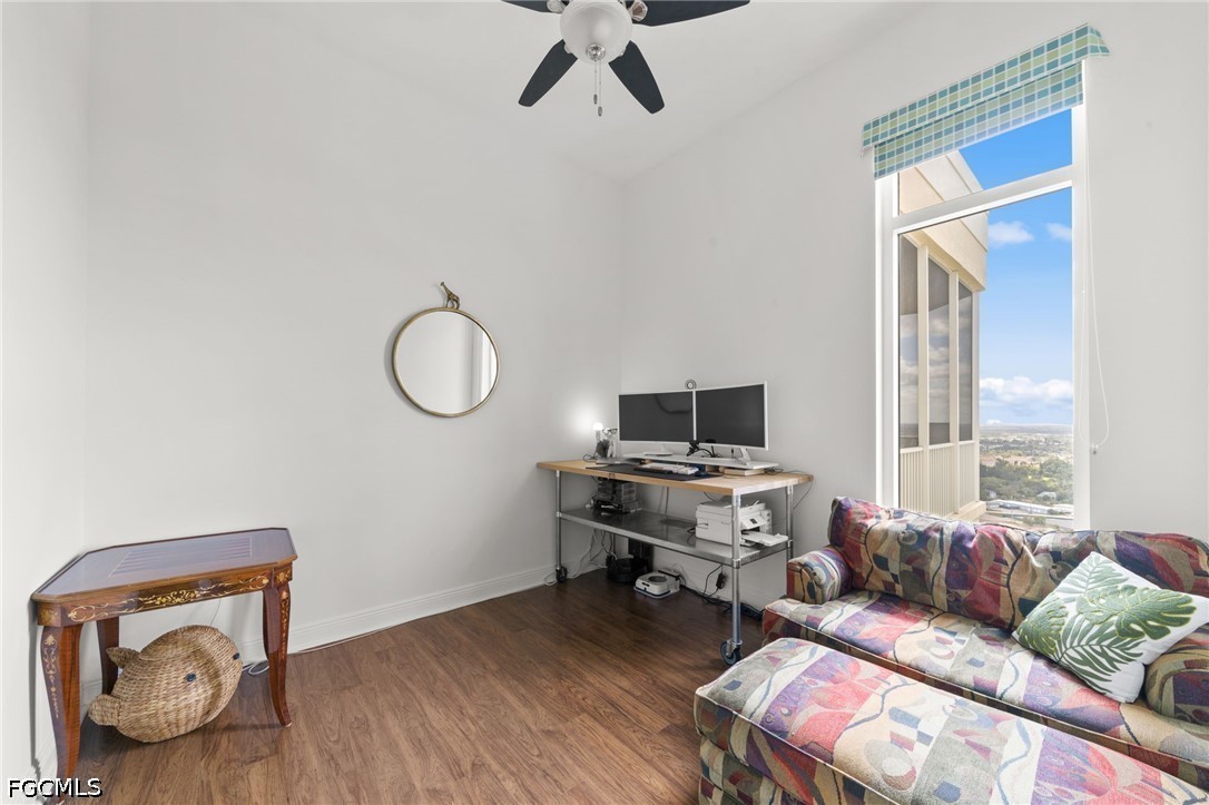 2743 First Street, Unit 2703 Fort Myers, FL 33916 - Photo 28 of 50 a living room with furniture and a window