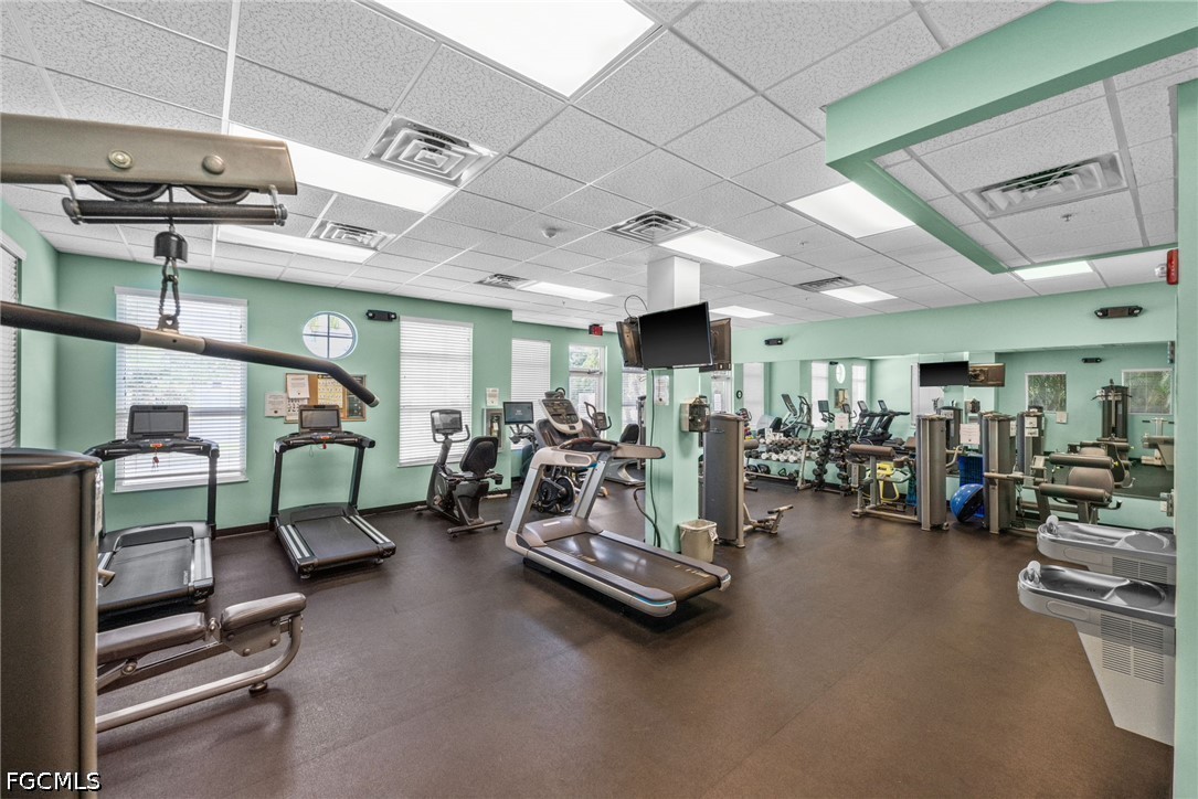 2743 First Street, Unit 2703 Fort Myers, FL 33916 - Photo 43 of 50 a room with lots of gym equipment
