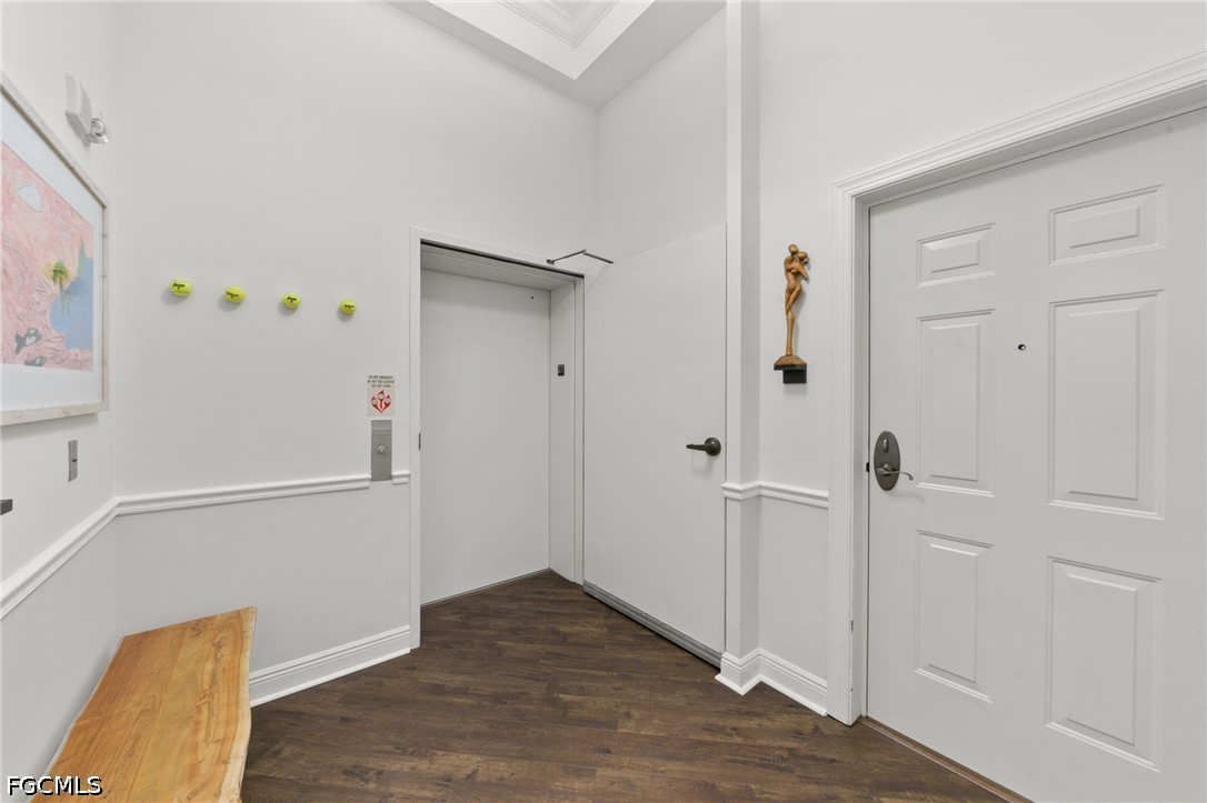 2743 First Street, Unit 2703 Fort Myers, FL 33916 - Photo 6 of 50 a view of an entryway with wooden floor