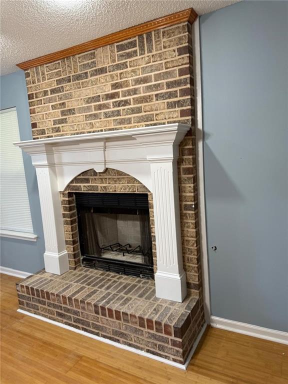 2337 Hollonville Road Brooks, GA 30205 - Photo 14 of 50 a view of an empty room with wooden floor fireplace and a window