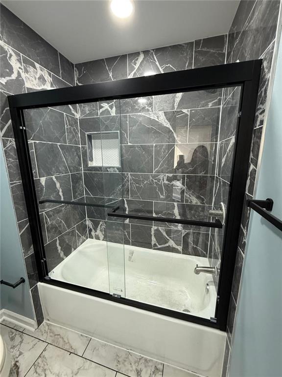 2337 Hollonville Road Brooks, GA 30205 - Photo 45 of 50 a bathroom with a glass shower door