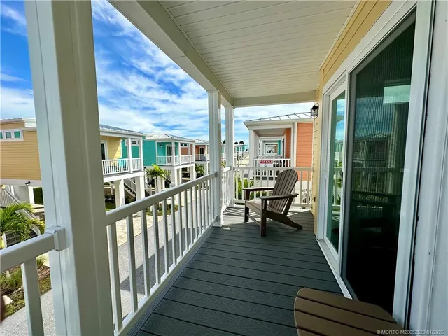 a view of a house with outdoor seating
