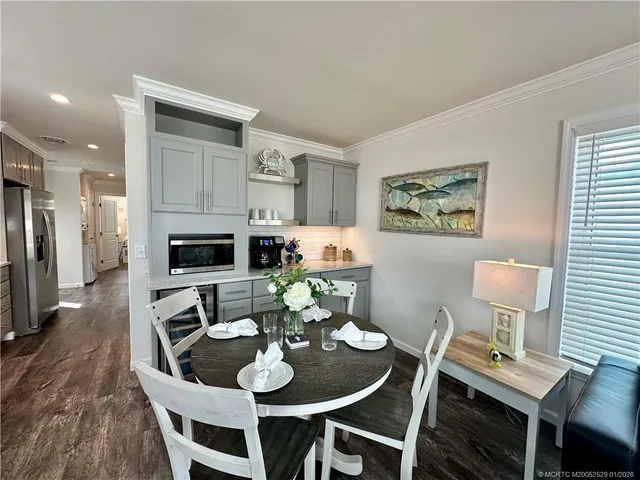 a dining room with furniture and a fireplace