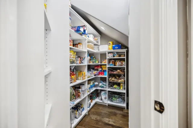 a kitchen with stainless steel appliances granite countertop a stove and cabinets