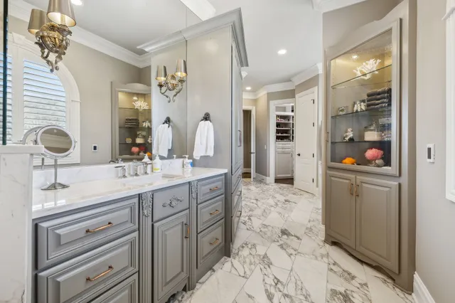 a view of a swimming pool with a patio and yard of the house