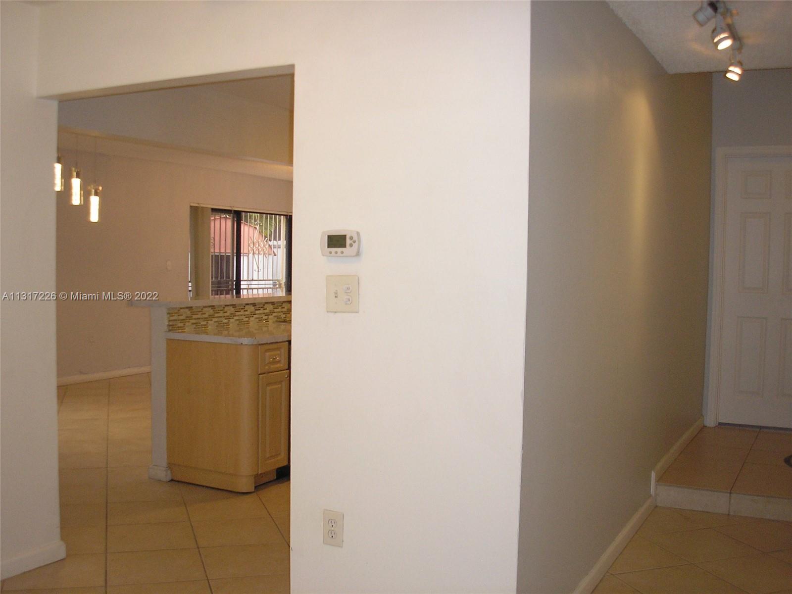 Fountainebleau Miami, FL 33174 - Photo 6 of 16 a view of walk in closet