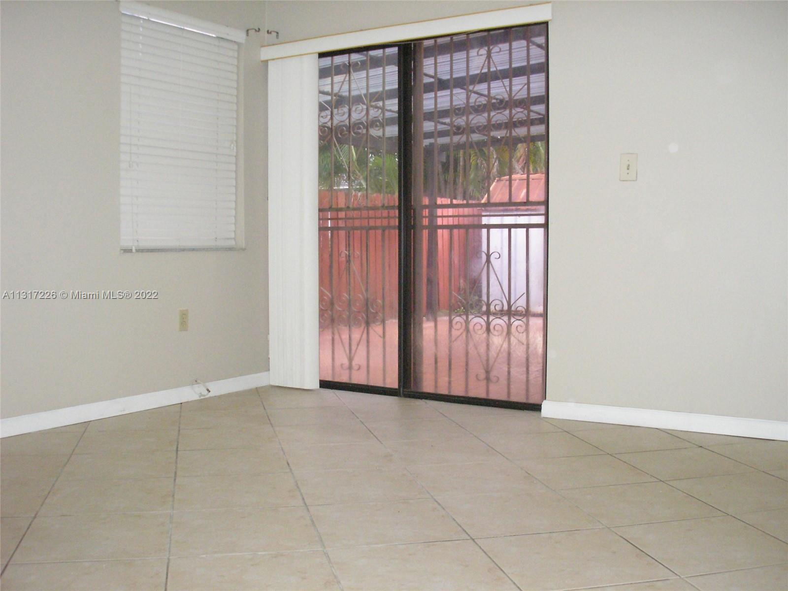 Fountainebleau Miami, FL 33174 - Photo 10 of 16 a view of an empty room with a window