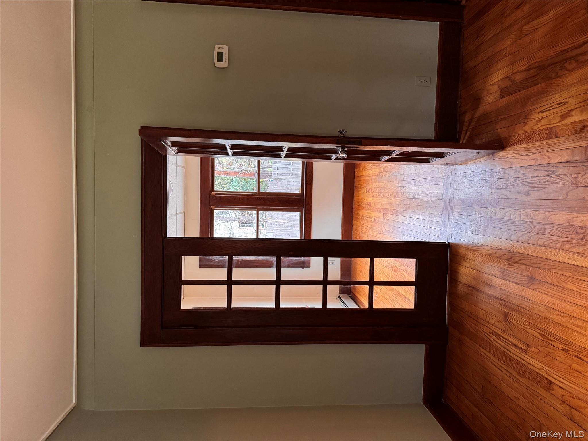 113 Brewery Road New City, NY 10956 - Photo 5 of 39 Spare room with hardwood / wood-style floors, french doors, and a baseboard radiator
