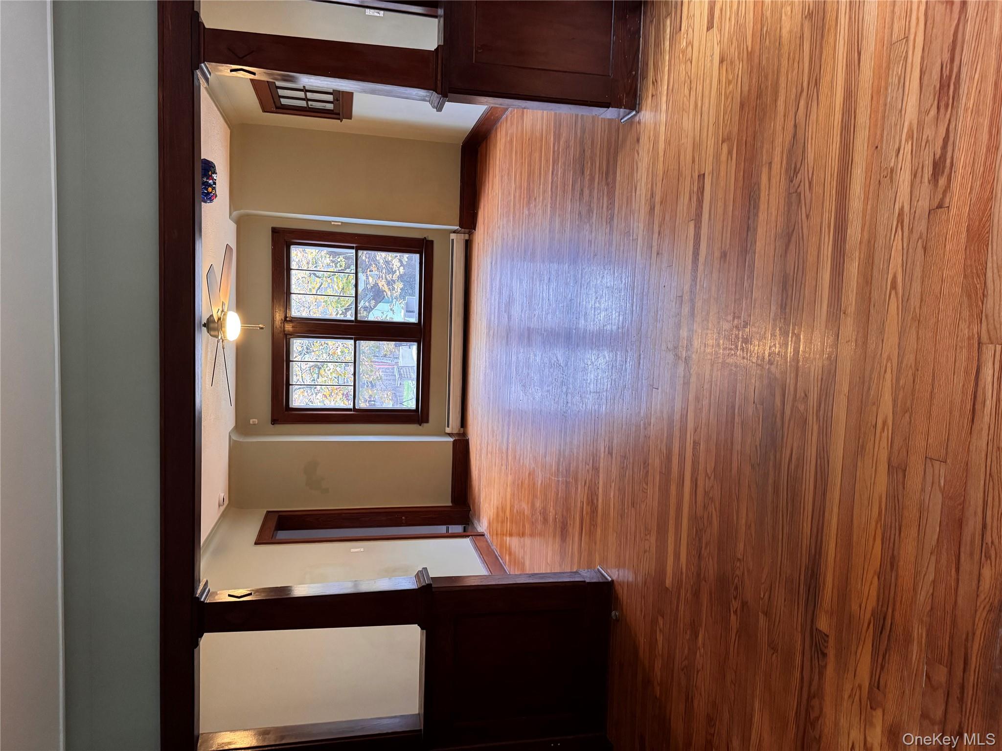 113 Brewery Road New City, NY 10956 - Photo 6 of 39 Spare room with light wood-type flooring, a baseboard radiator, and ceiling fan