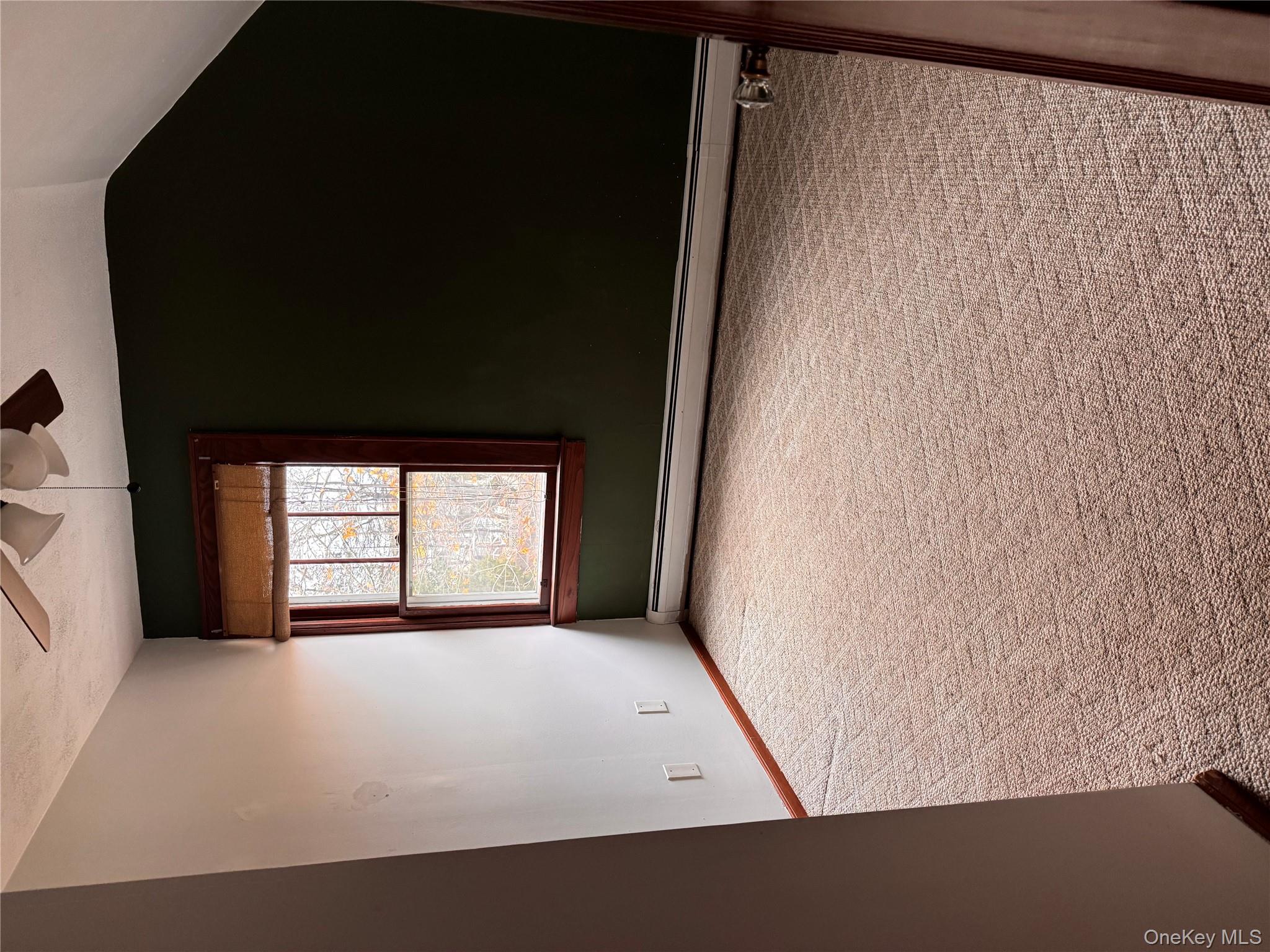 113 Brewery Road New City, NY 10956 - Photo 10 of 39 Bonus room with carpet, baseboard heating, a ceiling fan, vaulted ceiling, and a textured ceiling