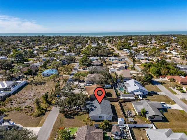 a view of street with palm trees