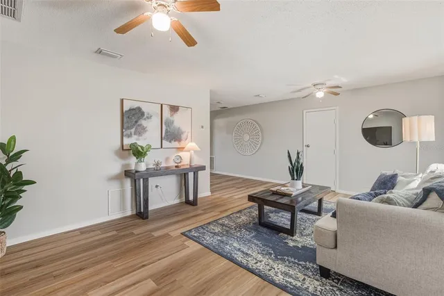 a living room with furniture and a window