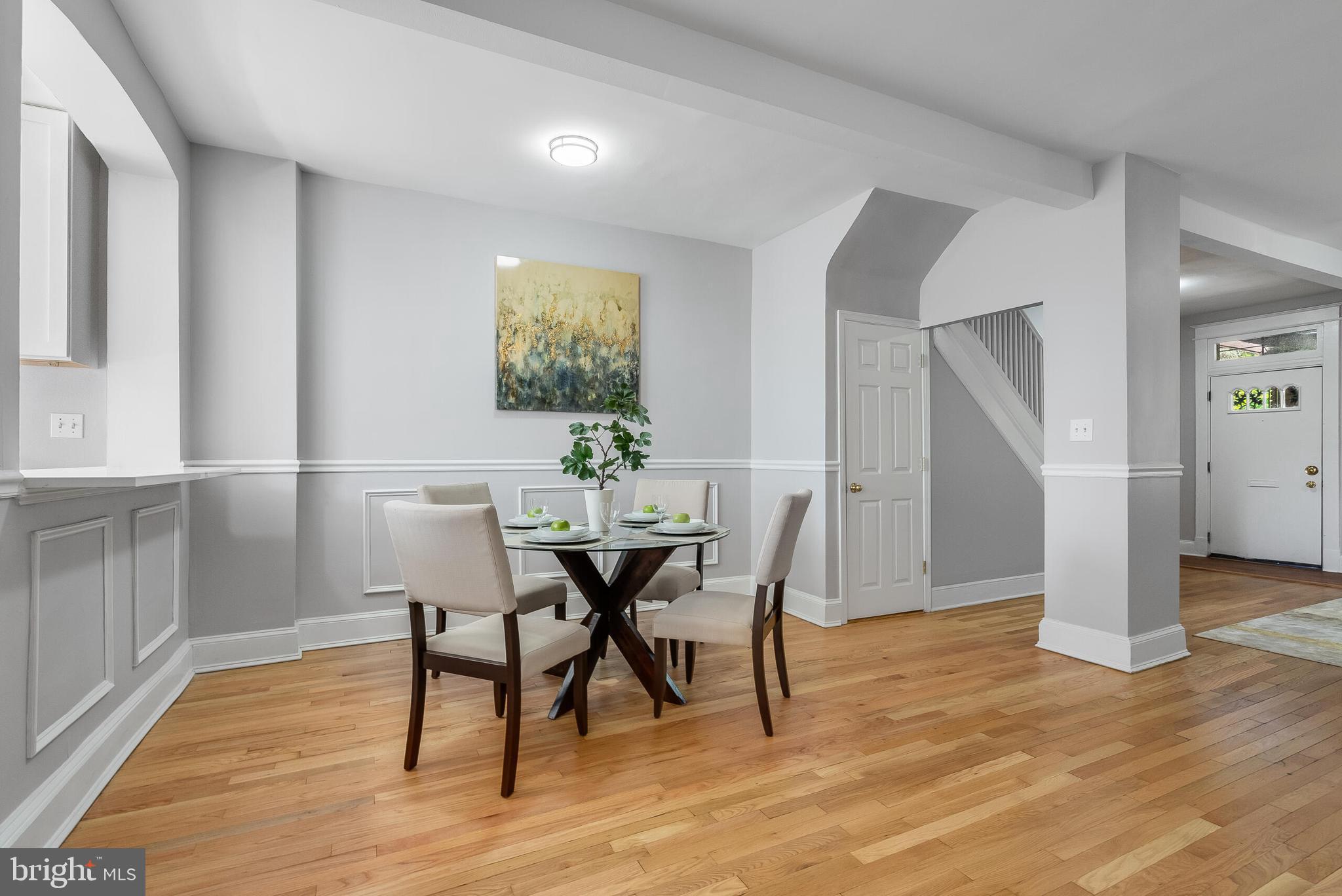 2116 North Capitol Street Northwest Washington, DC 20002 - Photo 16 of 50 a view of a dining room with furniture and wooden floor
