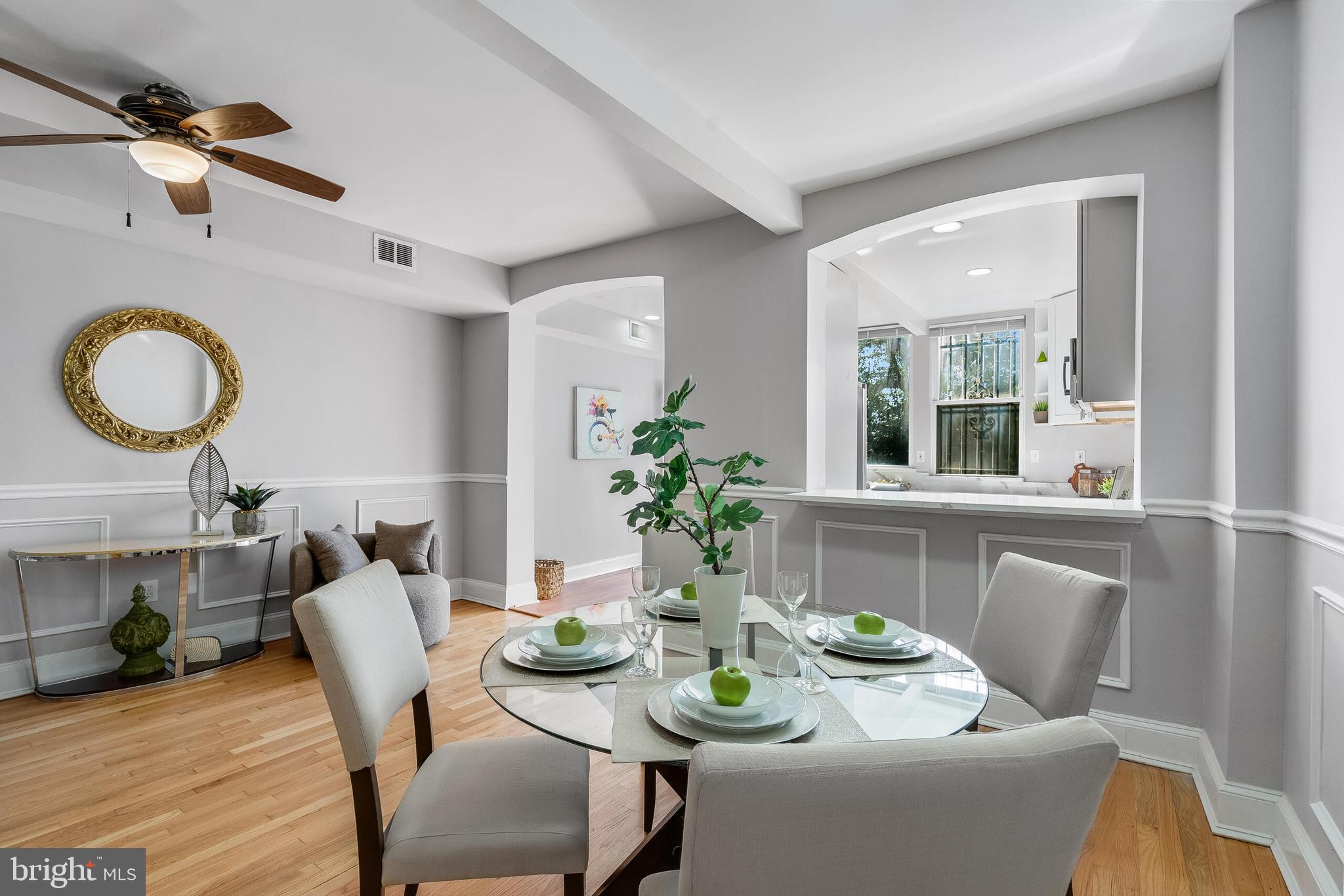 2116 North Capitol Street Northwest Washington, DC 20002 - Photo 17 of 50 a view of a dining room with furniture window and wooden floor