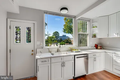 a bathroom with a sink and mirror