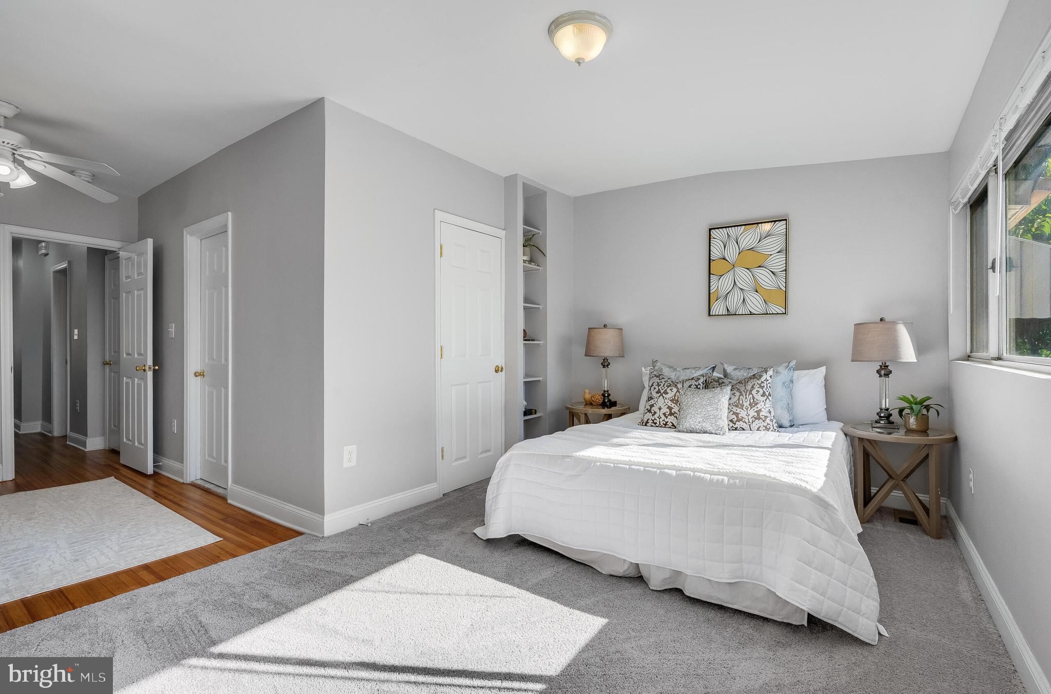 2116 North Capitol Street Northwest Washington, DC 20002 - Photo 30 of 50 a bedroom with a bed and a painting on the wall