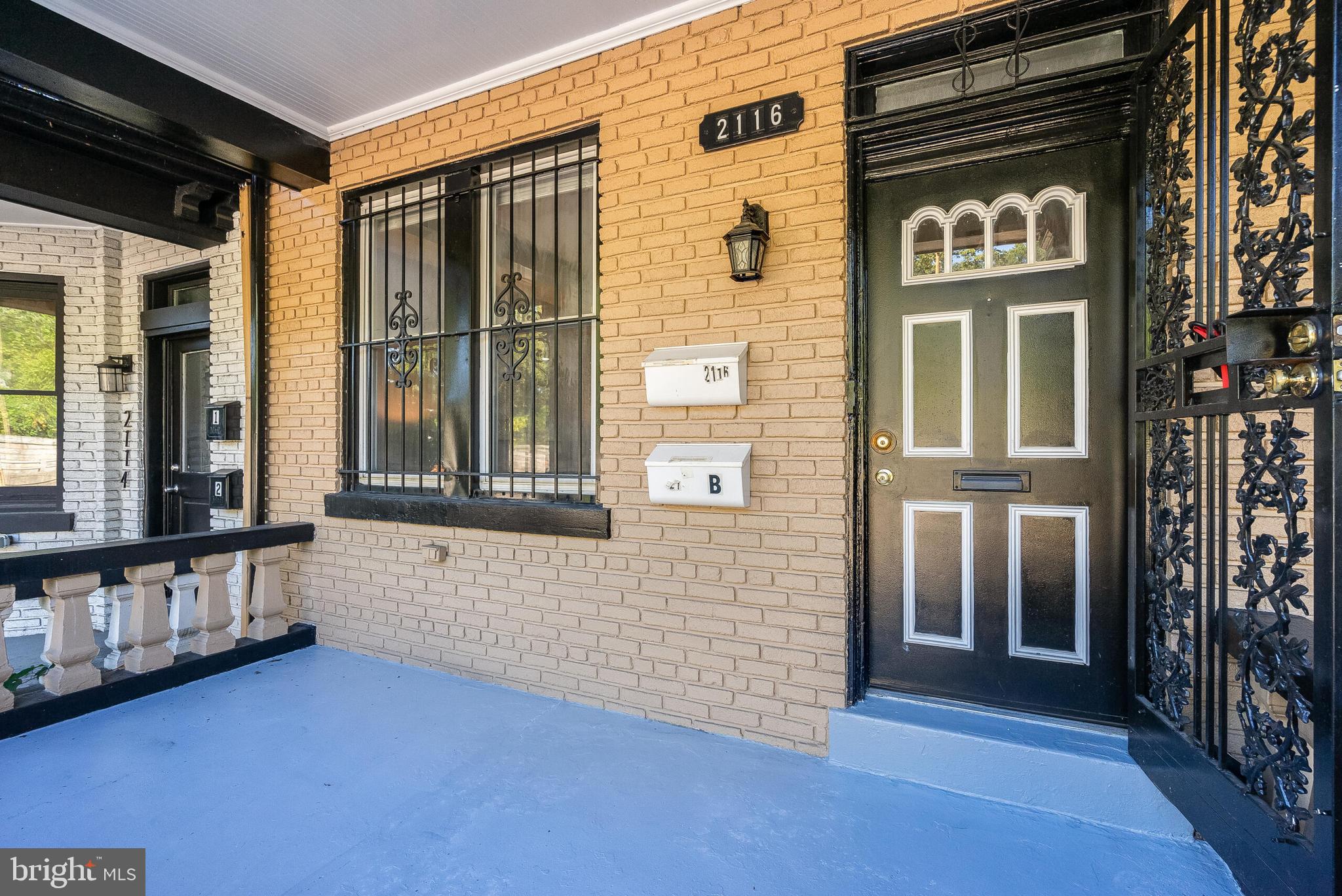 2116 North Capitol Street Northwest Washington, DC 20002 - Photo 3 of 50 a view of front door of house with a street