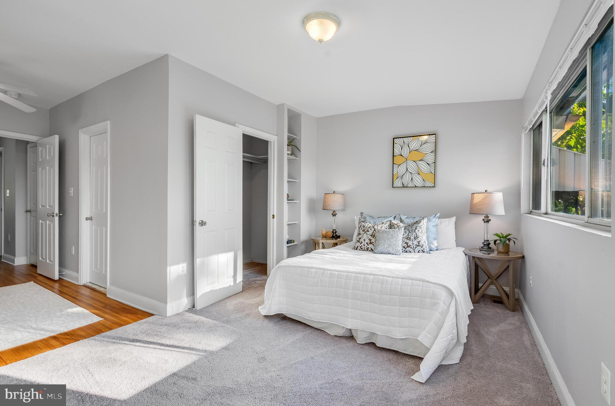 2116 North Capitol Street Northwest Washington, DC 20002 - Photo 32 of 50 a bedroom with a bed and a painting on the wall