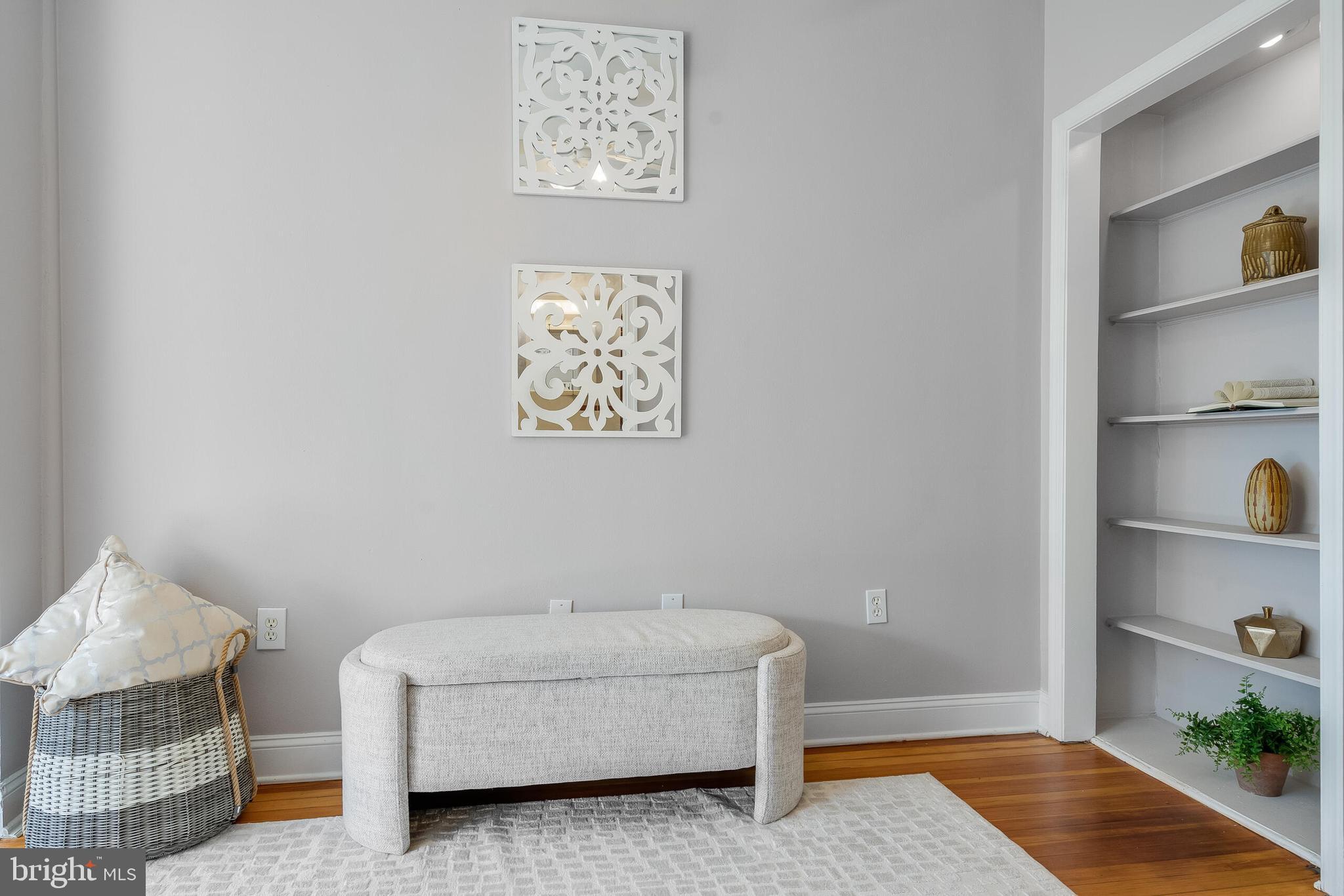 2116 North Capitol Street Northwest Washington, DC 20002 - Photo 36 of 50 a living room with furniture and a window