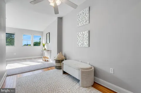 a bathroom with a sink vanity and a mirror