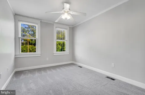 a view of entryway with a front door