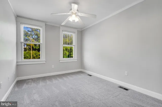 a view of entryway with a front door
