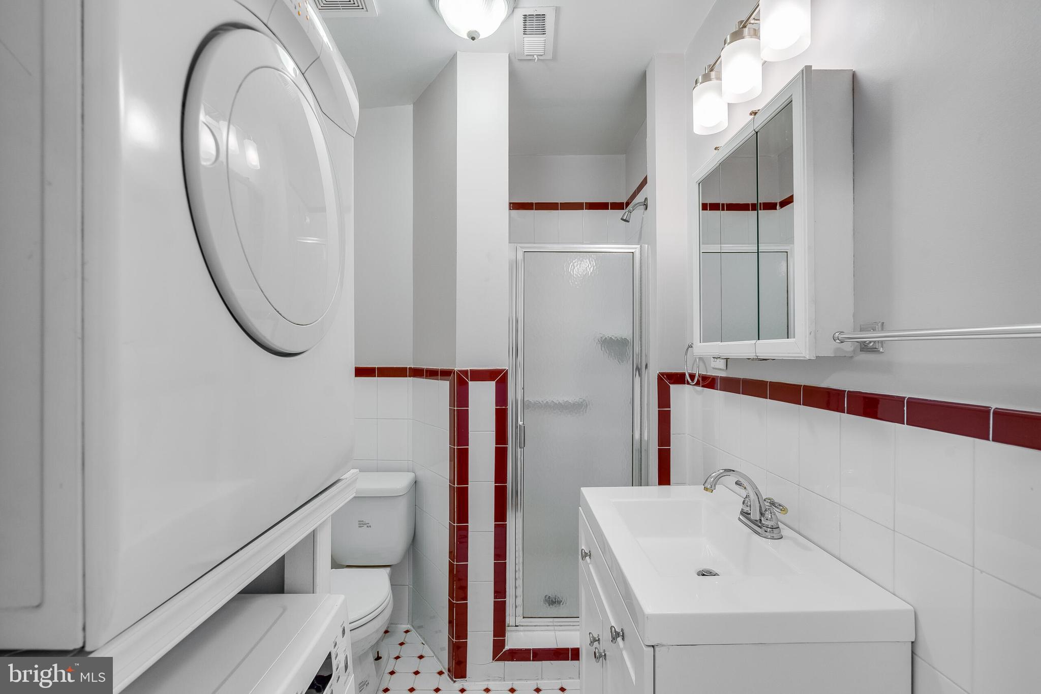 2116 North Capitol Street Northwest Washington, DC 20002 - Photo 46 of 50 a bathroom with a sink and a mirror
