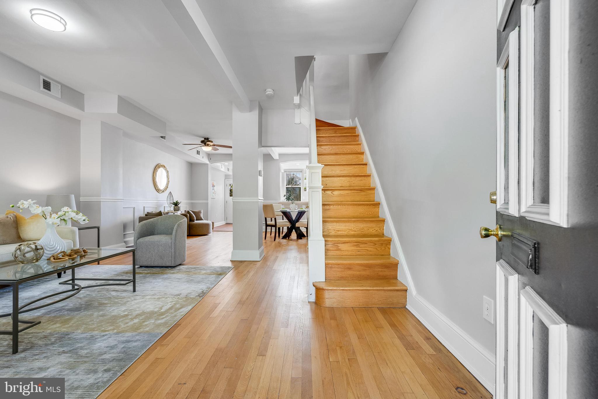 2116 North Capitol Street Northwest Washington, DC 20002 - Photo 6 of 50 a living room with furniture and wooden floor